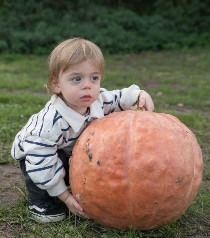 kindje met pompoen, foto Isa DSPhotography